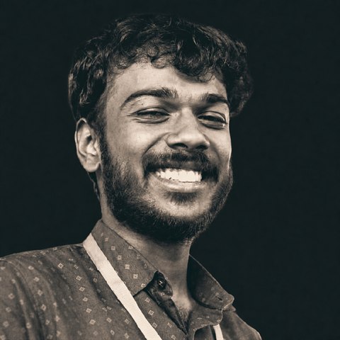 Ajay Mukund A smiling.